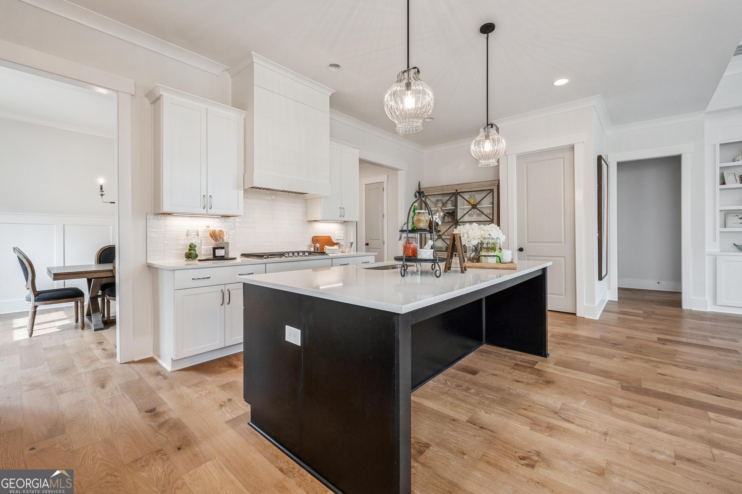 charlotte atlanta new home kitchen with large kitchen island and pendant lighting