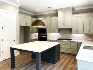 interior of a kitchen at an inventory home at Pirates Cove