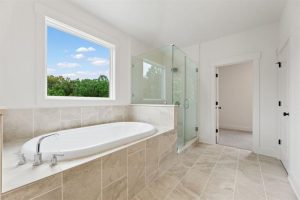 luxury bathroom in inventory home at White Post on Lake Lanier in Forsyth County